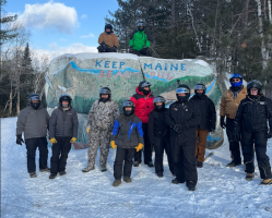 Group photo from snowmobile trip